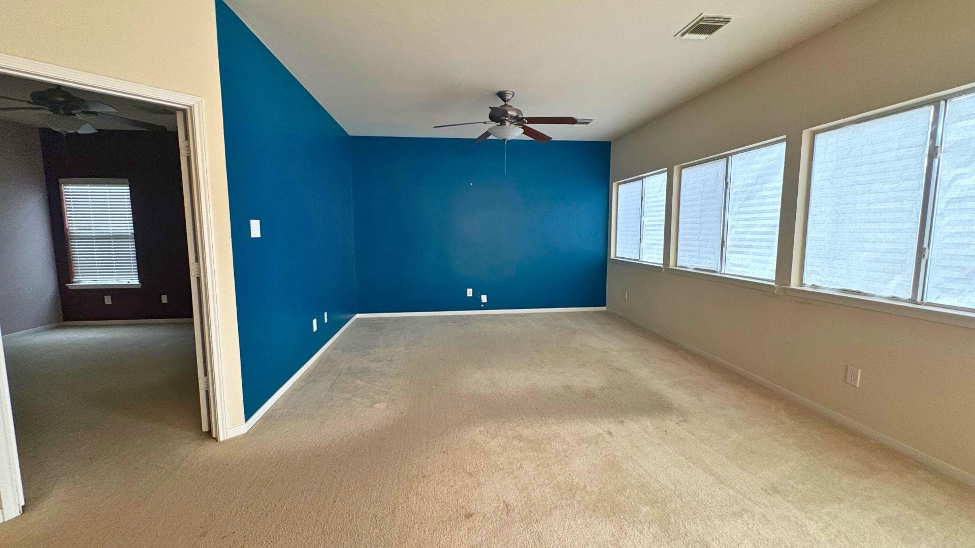 21842 Grassy Hill Lane Spring, TX 77388 - Photo 4 of 9 a view of an empty room with a window