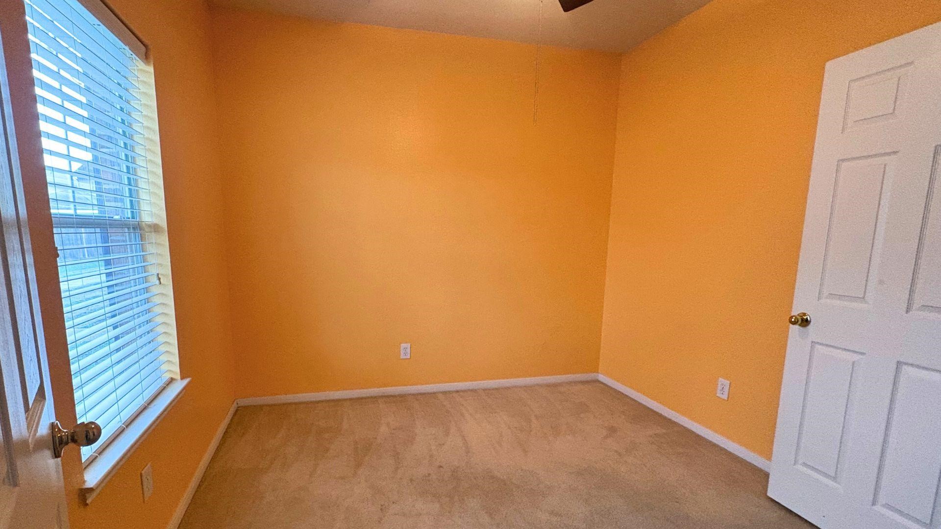 21842 Grassy Hill Lane Spring, TX 77388 - Photo 5 of 9 a view of an empty room with a window