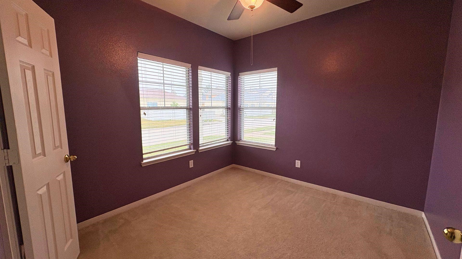 21842 Grassy Hill Lane Spring, TX 77388 - Photo 6 of 9 a view of an empty room with a window