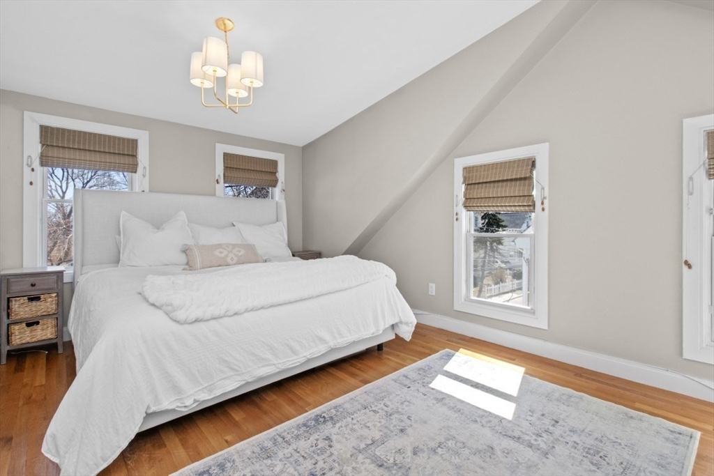 16 Port Norfolk Street, Unit 2 Boston, MA 02122 - Photo 12 of 20 a bedroom with bed and a window