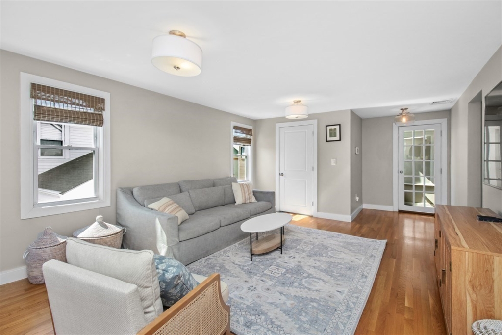 16 Port Norfolk Street, Unit 2 Boston, MA 02122 - Photo 4 of 20 a living room with furniture and a window