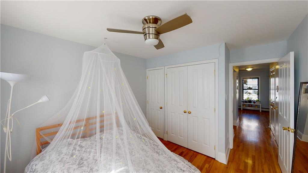 722 Madison Street Brooklyn, NY 11221 - Photo 22 of 29 wooden floor with white walls
