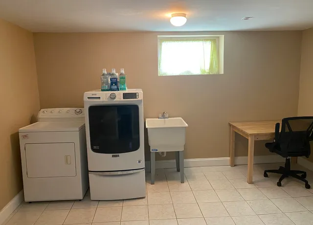 a view of kitchen and utility room