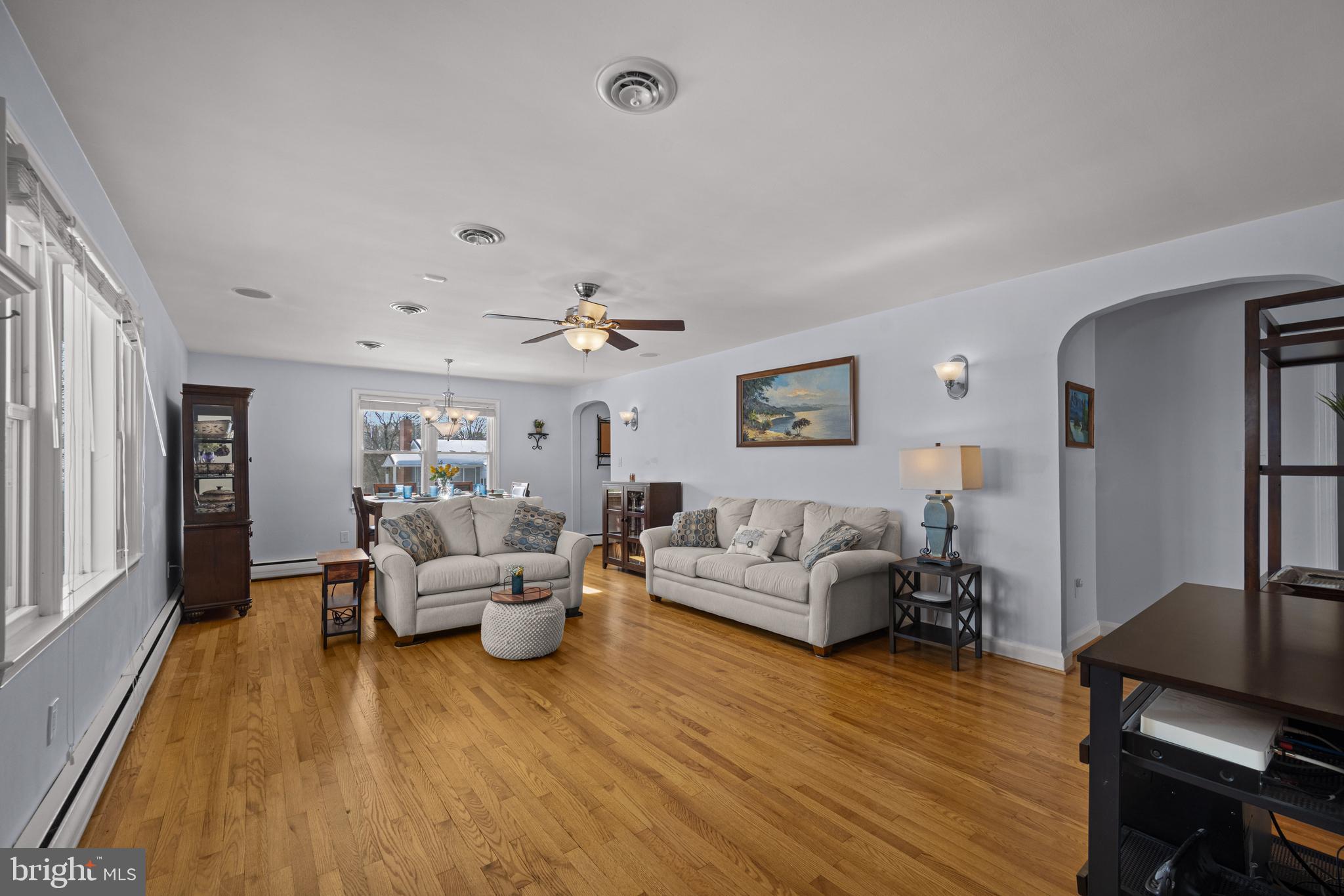 6226 2nd Avenue Hanover, MD 21076 - Photo 12 of 48 a living room with furniture and wooden floor