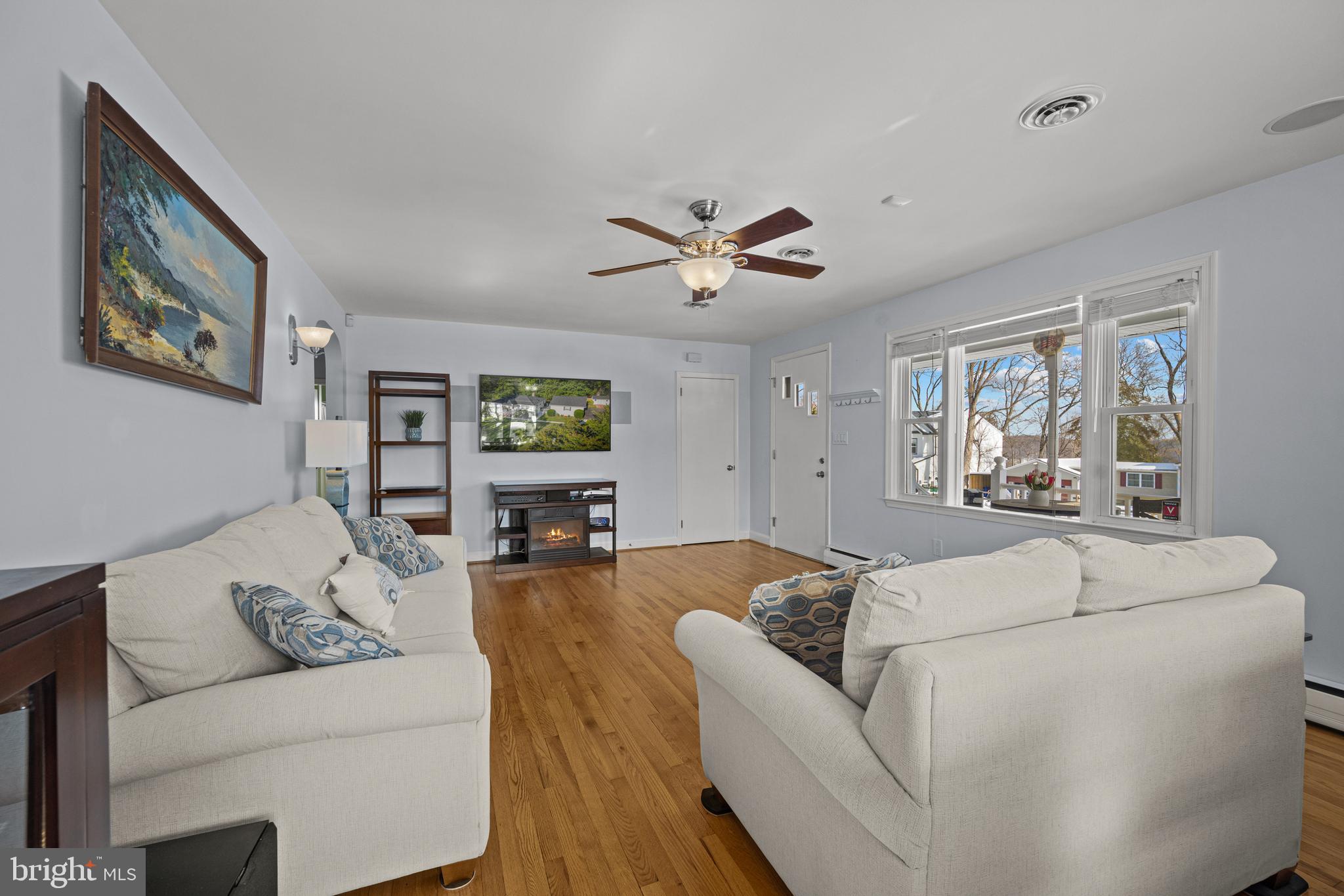6226 2nd Avenue Hanover, MD 21076 - Photo 13 of 48 a living room with furniture and a large window