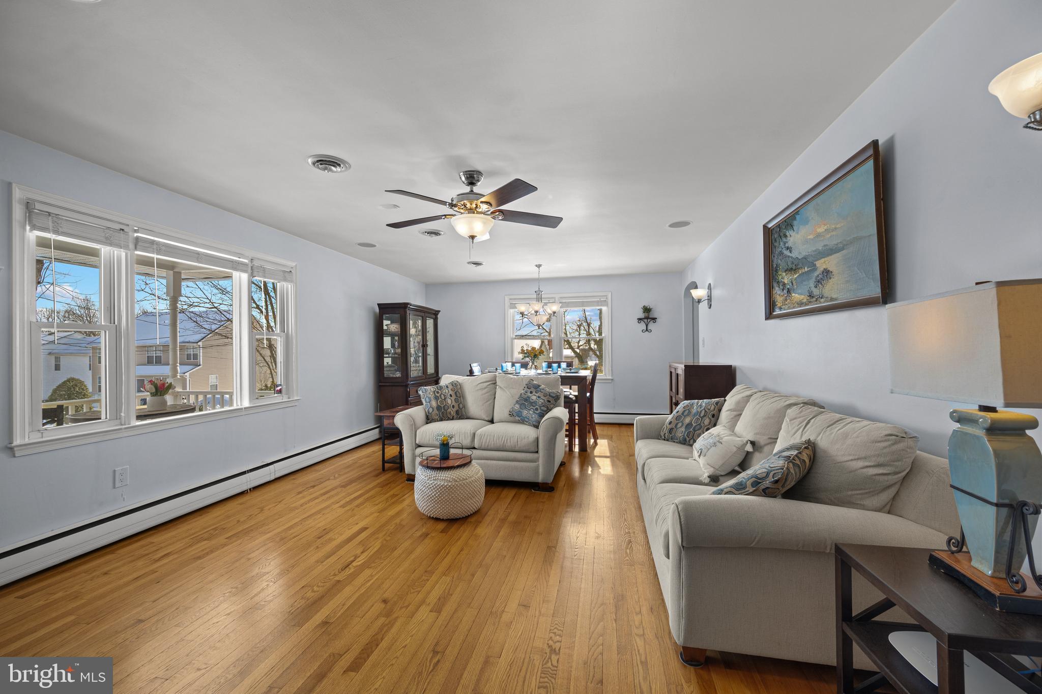 6226 2nd Avenue Hanover, MD 21076 - Photo 14 of 48 a living room with furniture and wooden floor