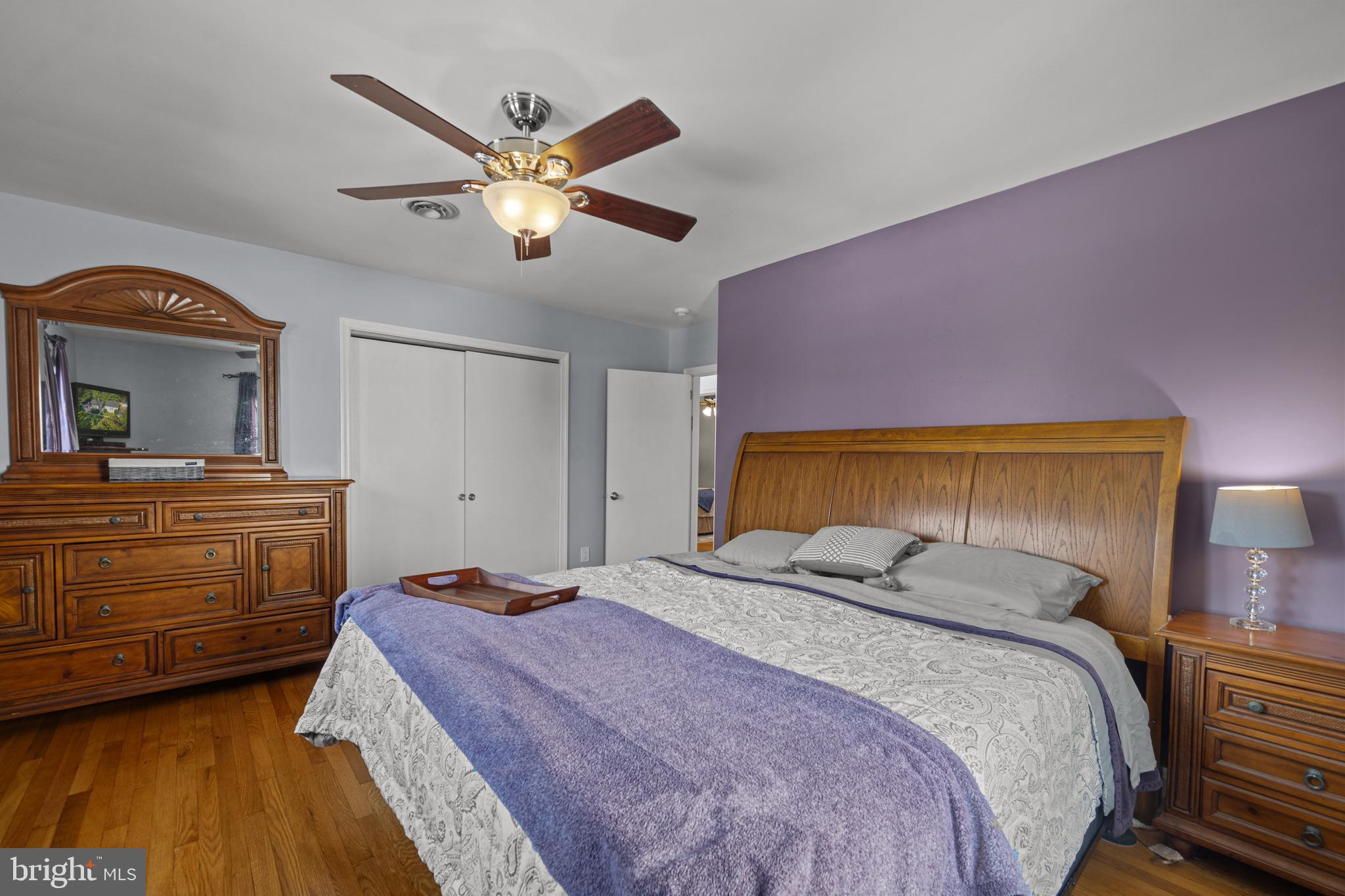 6226 2nd Avenue Hanover, MD 21076 - Photo 15 of 48 a bedroom with a bed and a chandelier