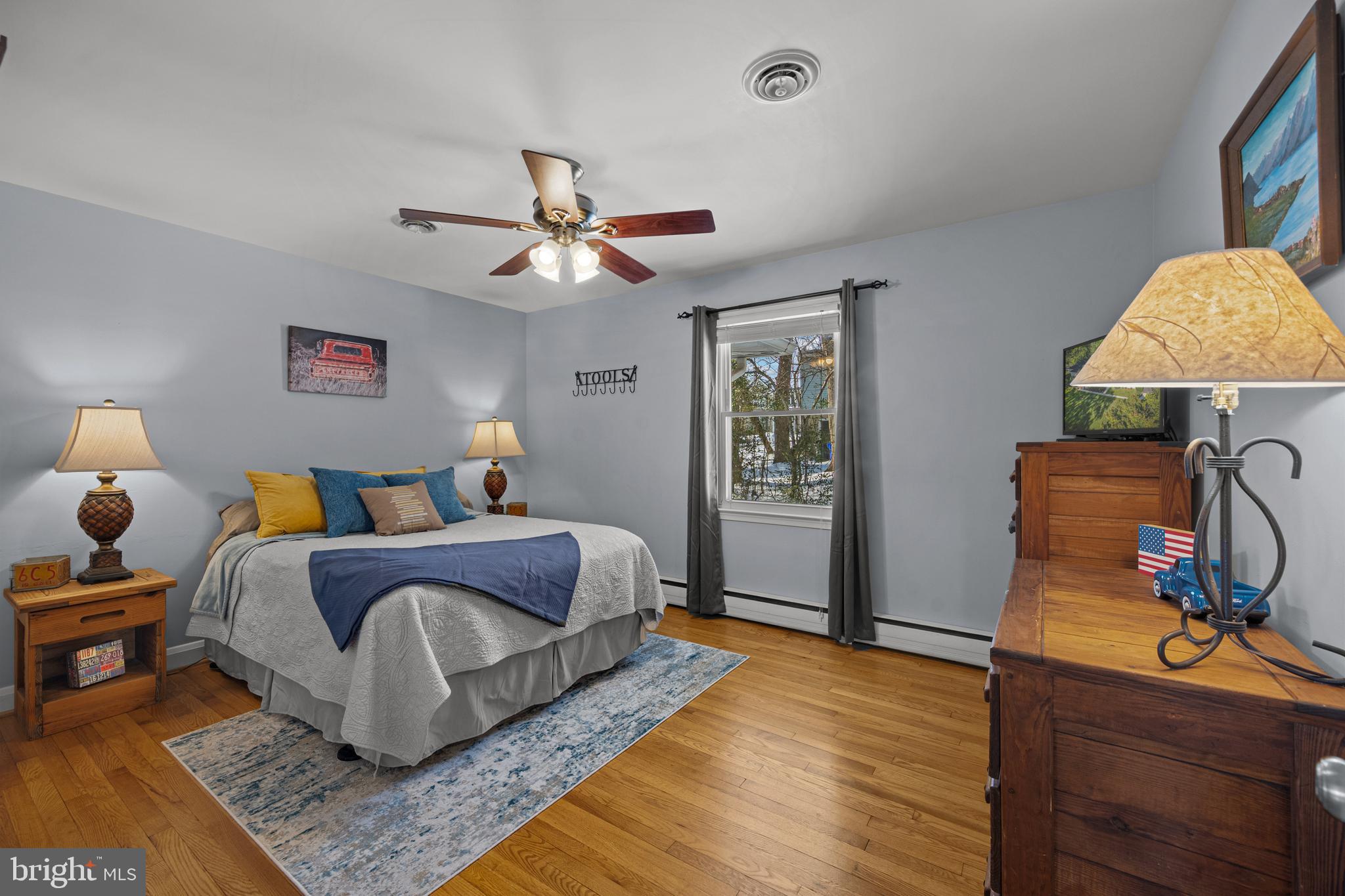 6226 2nd Avenue Hanover, MD 21076 - Photo 18 of 48 a bedroom with bed and window