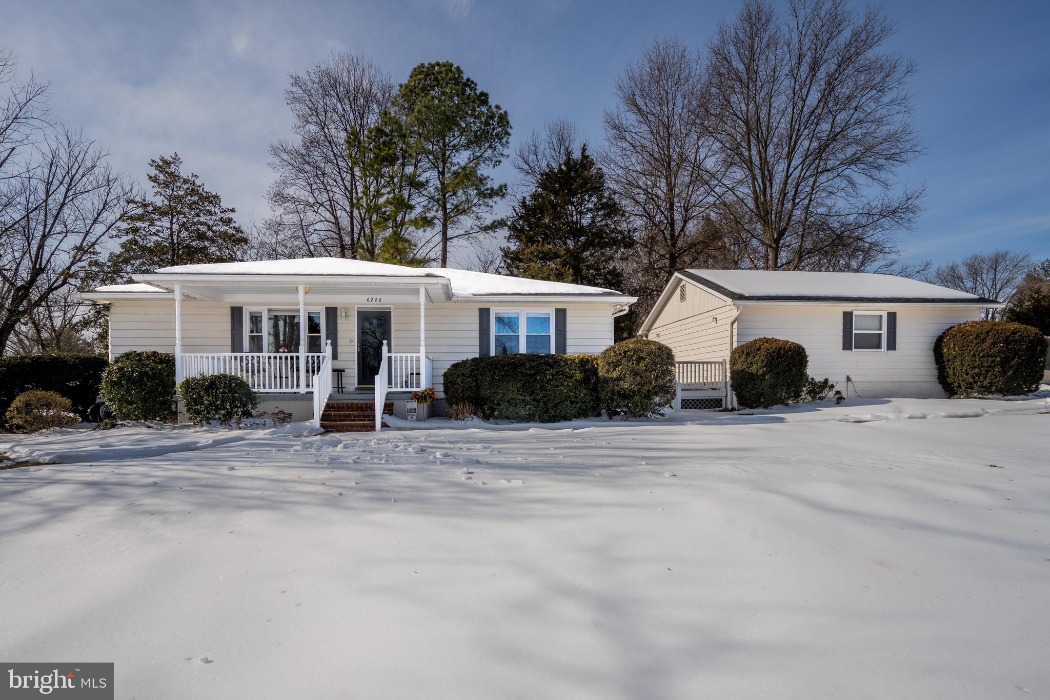 6226 2nd Avenue Hanover, MD 21076 - Photo 31 of 48 a view of a house with a yard and large trees