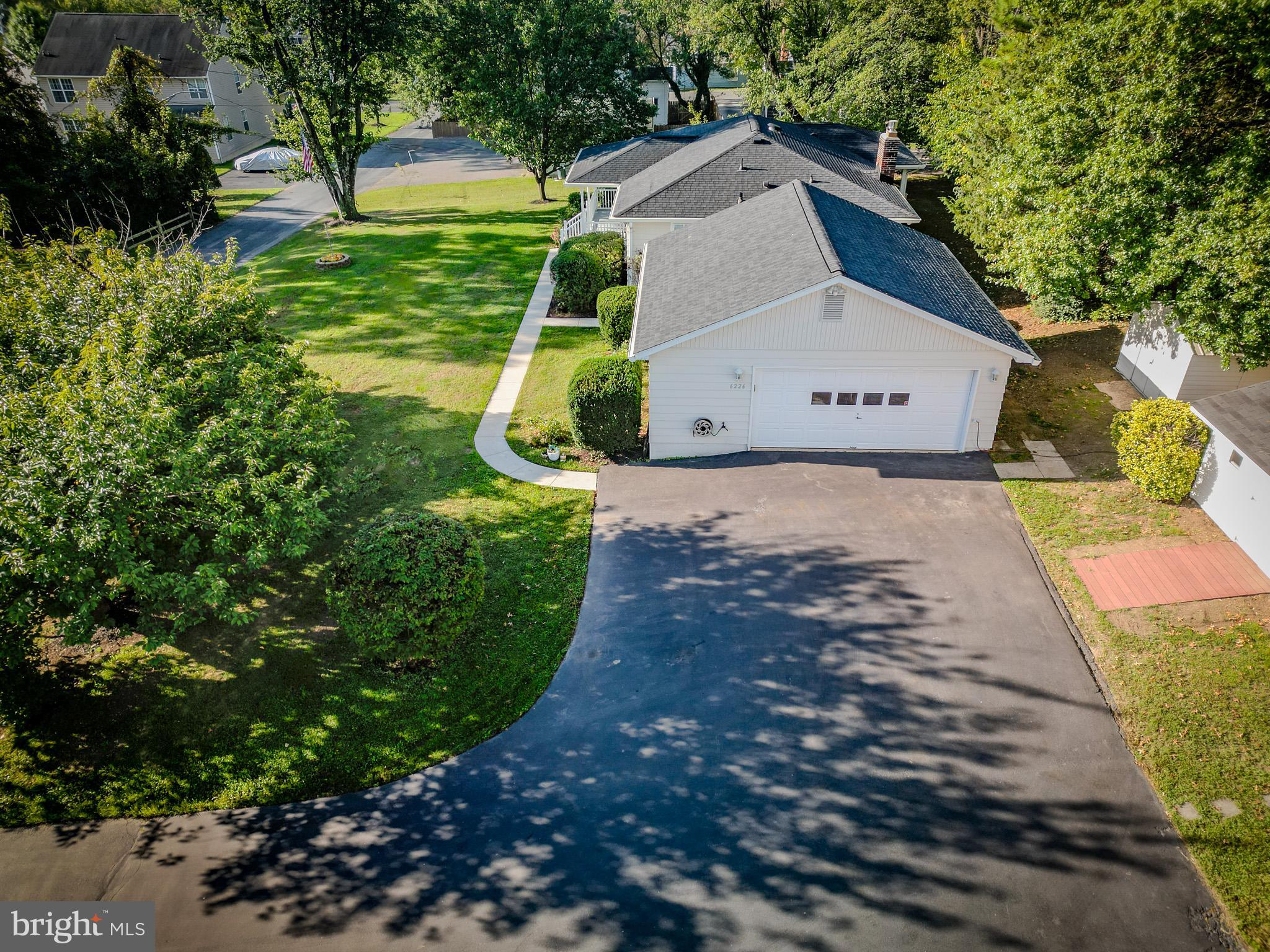 6226 2nd Avenue Hanover, MD 21076 - Photo 42 of 48 a view of a house with a yard