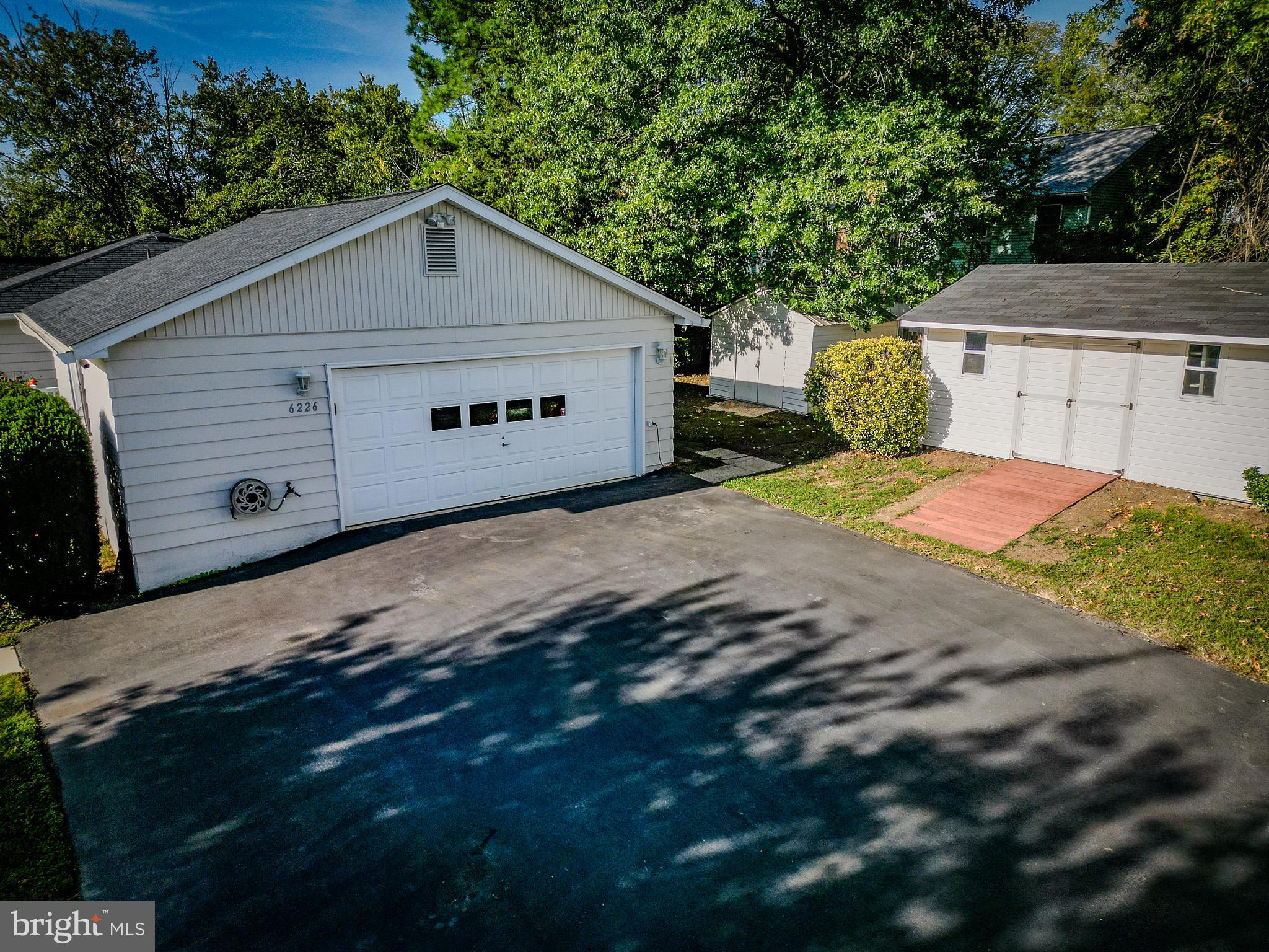 6226 2nd Avenue Hanover, MD 21076 - Photo 43 of 48 a view of a small house with a yard