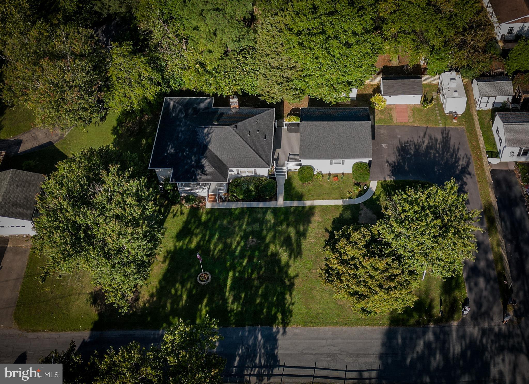 6226 2nd Avenue Hanover, MD 21076 - Photo 44 of 48 an aerial view of a house with a yard and garden