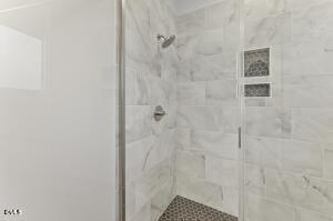 2760 River Meadow Spring Hope, NC 27882 - Photo 26 of 42 a bathroom with a shower