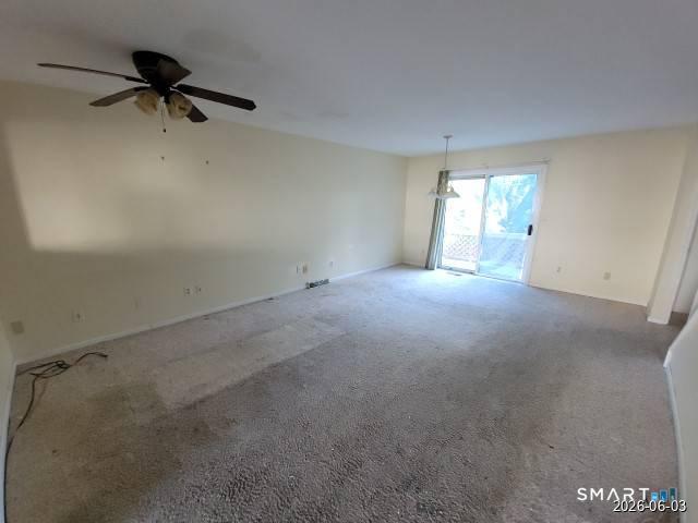 28 Commodore Cmns, Unit 28 Derby, CT 06418 - Photo 5 of 17 a view of a room with a window and a ceiling fan