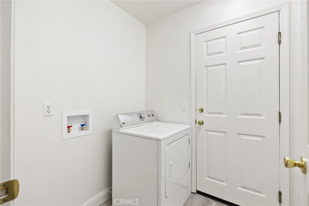 1165 Fig Street Corning, CA 96021 - Photo 24 of 46 a utility room with a sink