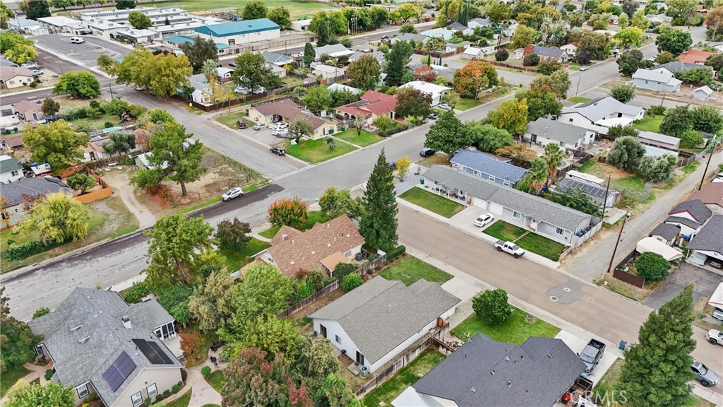 1165 Fig Street Corning, CA 96021 - Photo 32 of 46 an aerial view of a city with lots of residential buildings