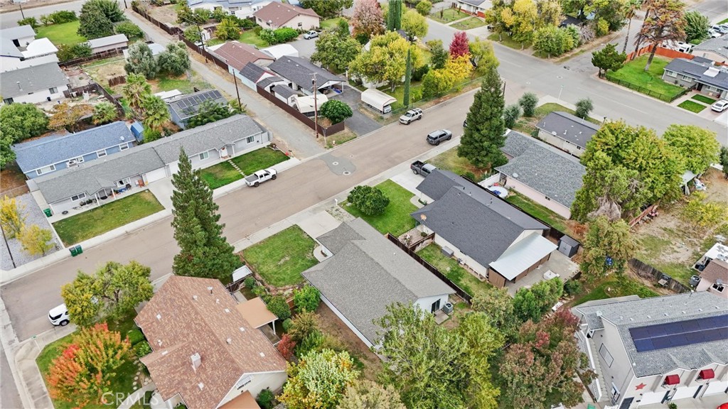 1165 Fig Street Corning, CA 96021 - Photo 33 of 46 an aerial view of a house with a yard