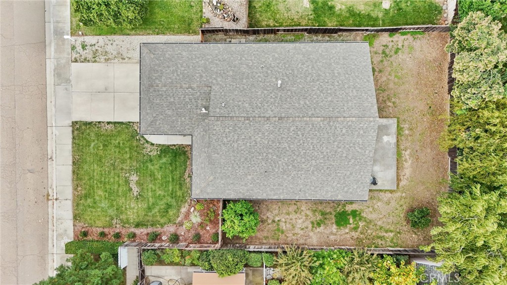 1165 Fig Street Corning, CA 96021 - Photo 34 of 46 an aerial view of a house with a yard and lake view