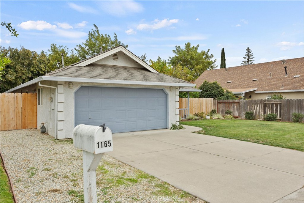 1165 Fig Street Corning, CA 96021 - Photo 44 of 46 a front view of a house with garden