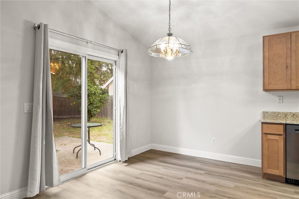 1165 Fig Street Corning, CA 96021 - Photo 9 of 46 a view of an empty room with a window