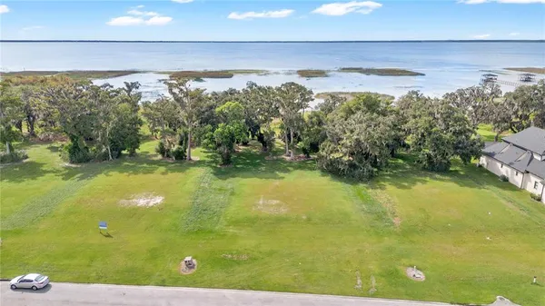 a view of a lake with a city