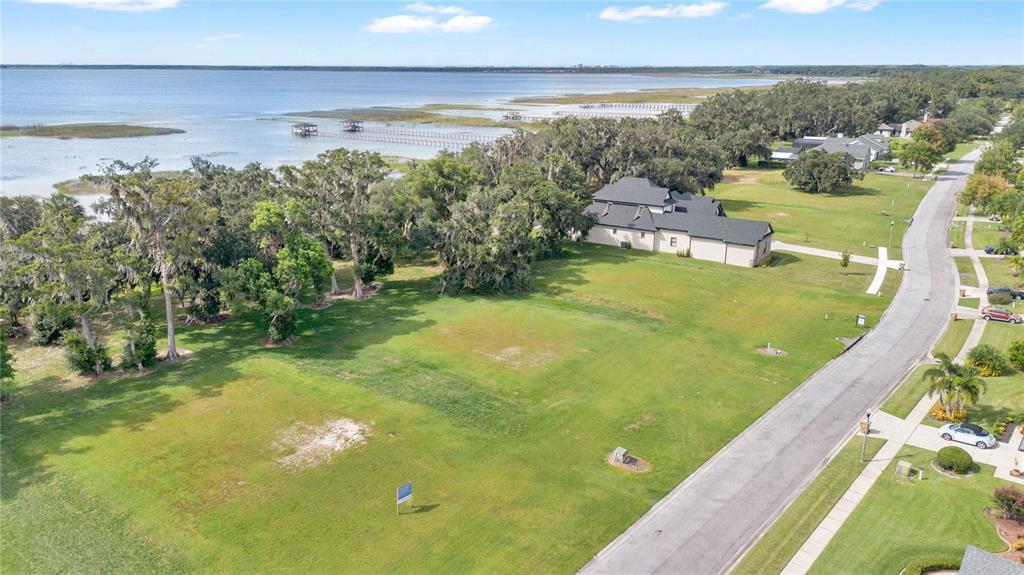 4816 Calasans Avenue St. Cloud, FL 34771 - Photo 9 of 10 a view of a lake with a yard