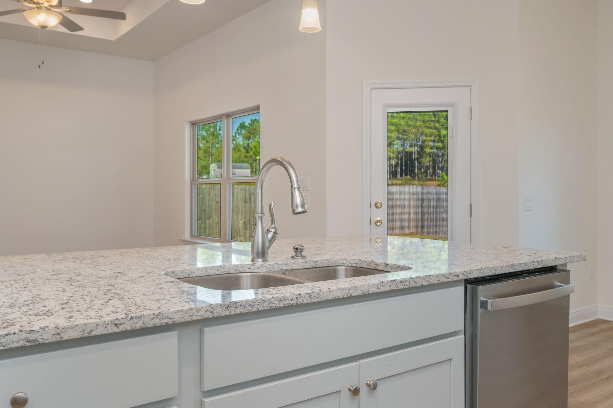 10152 American Farms Road Milton, FL 32583 - Photo 16 of 49 a bathroom with a granite countertop sink and a mirror