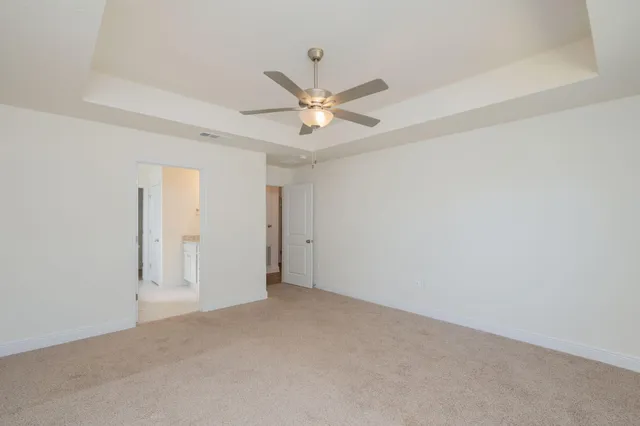a bathroom with double sink and a mirror