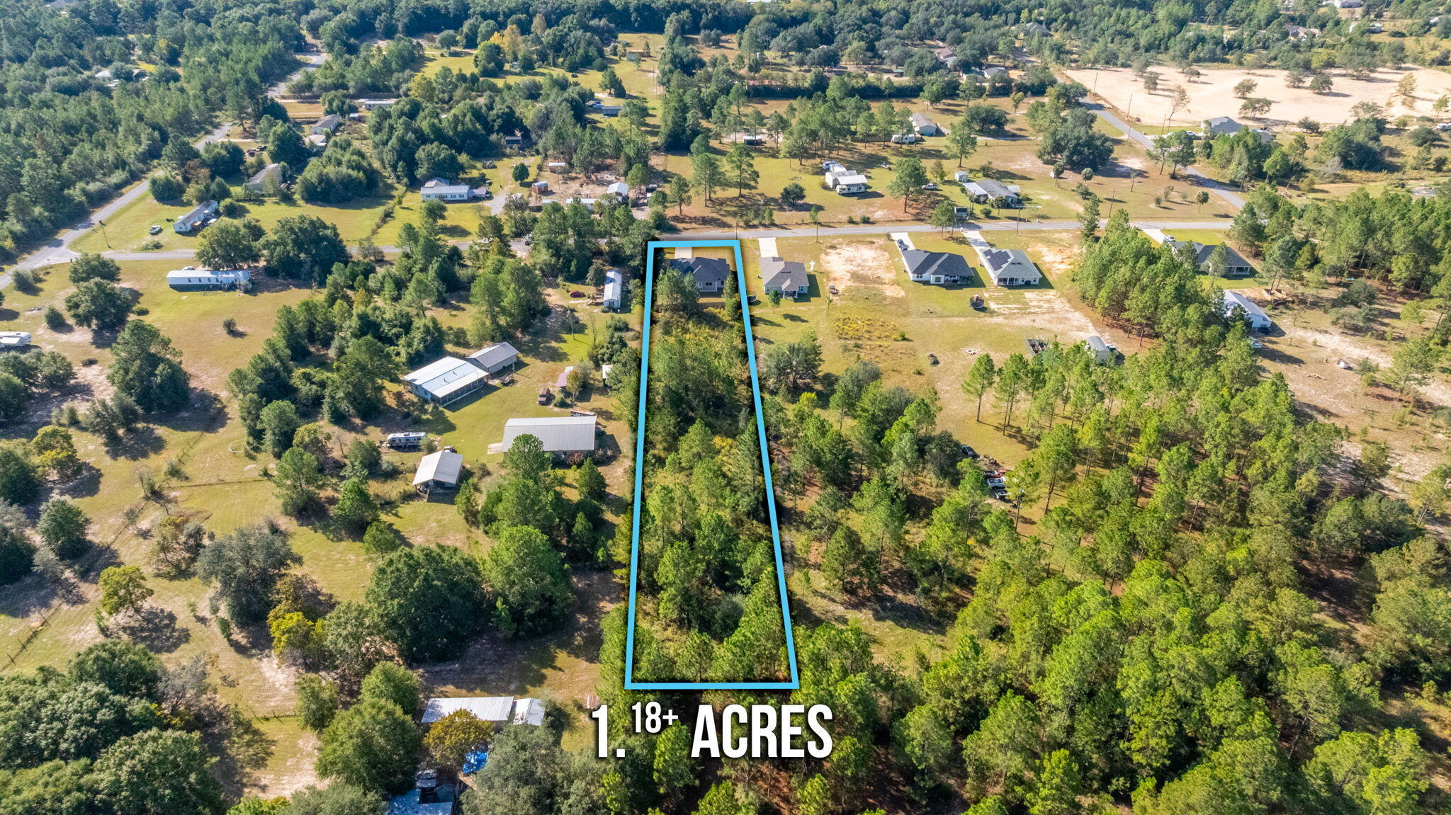 10152 American Farms Road Milton, FL 32583 - Photo 46 of 49 an aerial view of residential houses with outdoor space