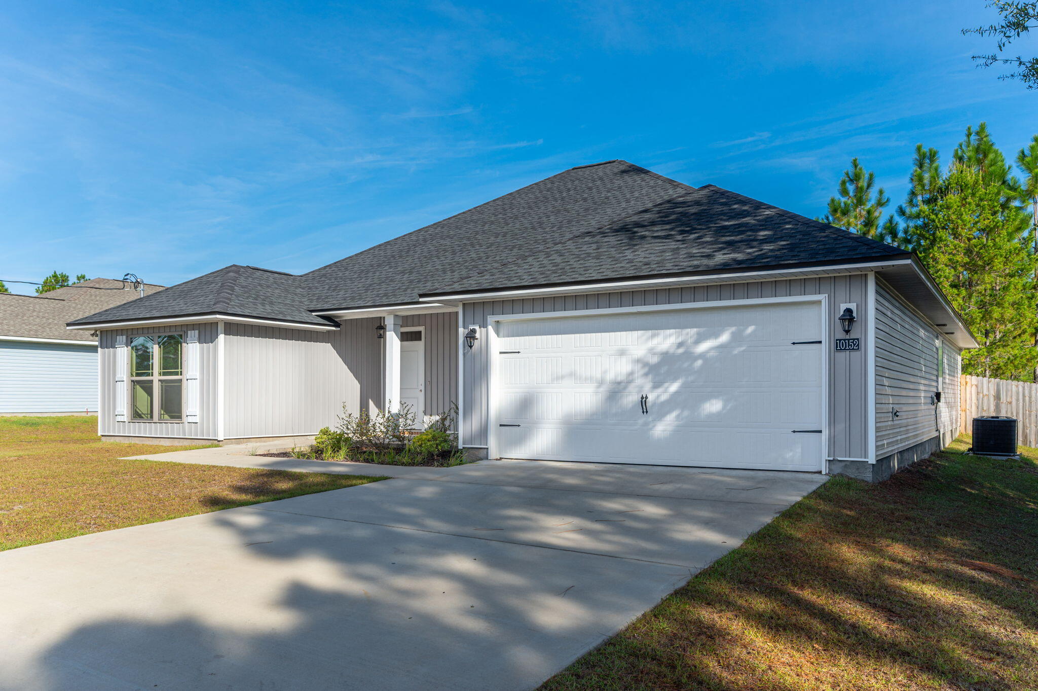 10152 American Farms Road Milton, FL 32583 - Photo 5 of 49 a front view of house with yard