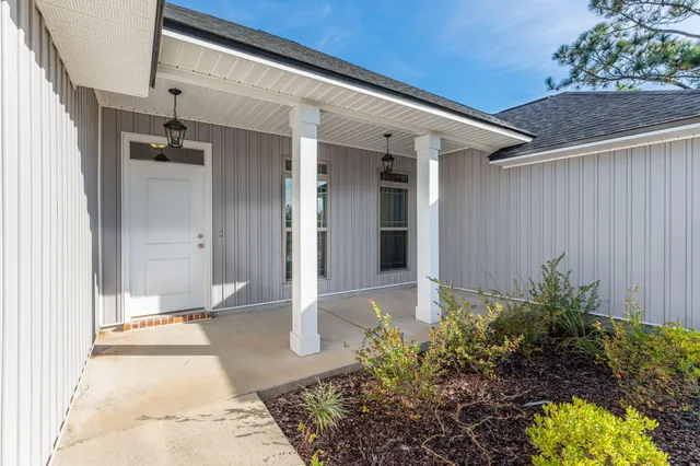 a view of a entryway door front of house