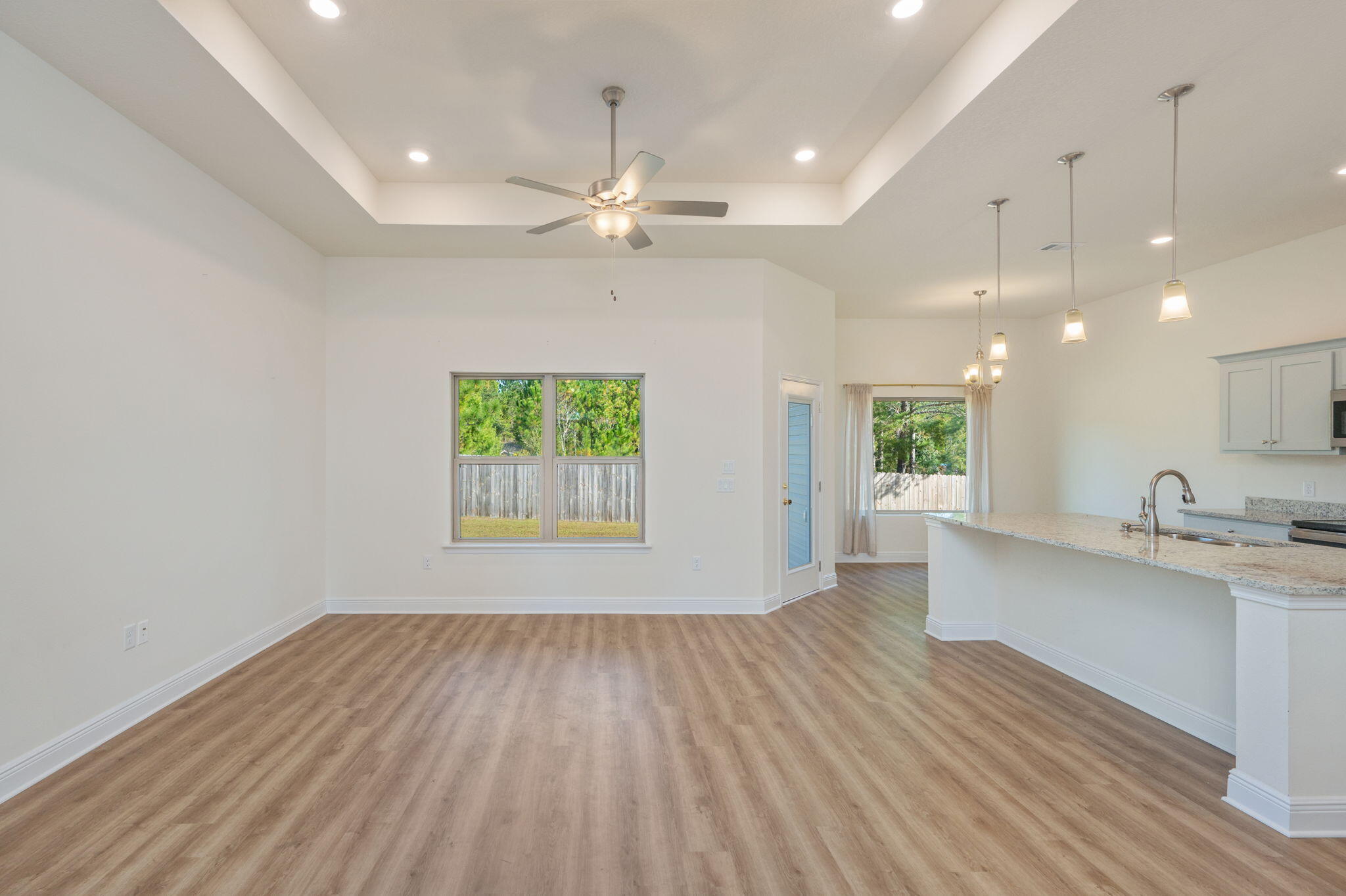 10152 American Farms Road Milton, FL 32583 - Photo 9 of 49 a view of kitchen and a window