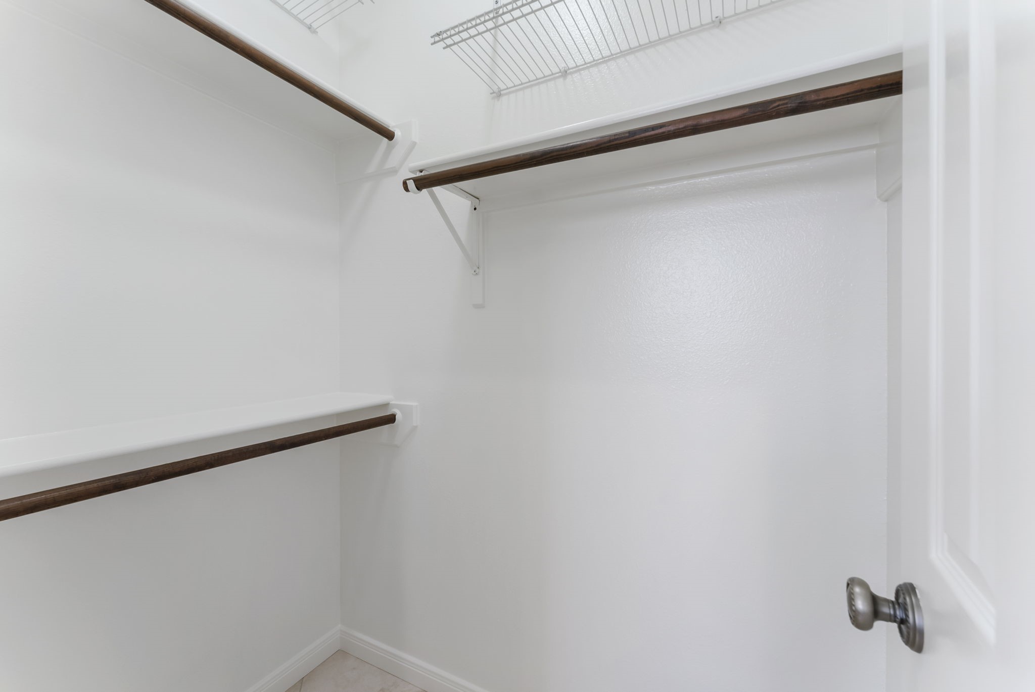38 North Dragonwood Place Spring, TX 77381 - Photo 19 of 50 Walk-in closet in the primary bathroom.