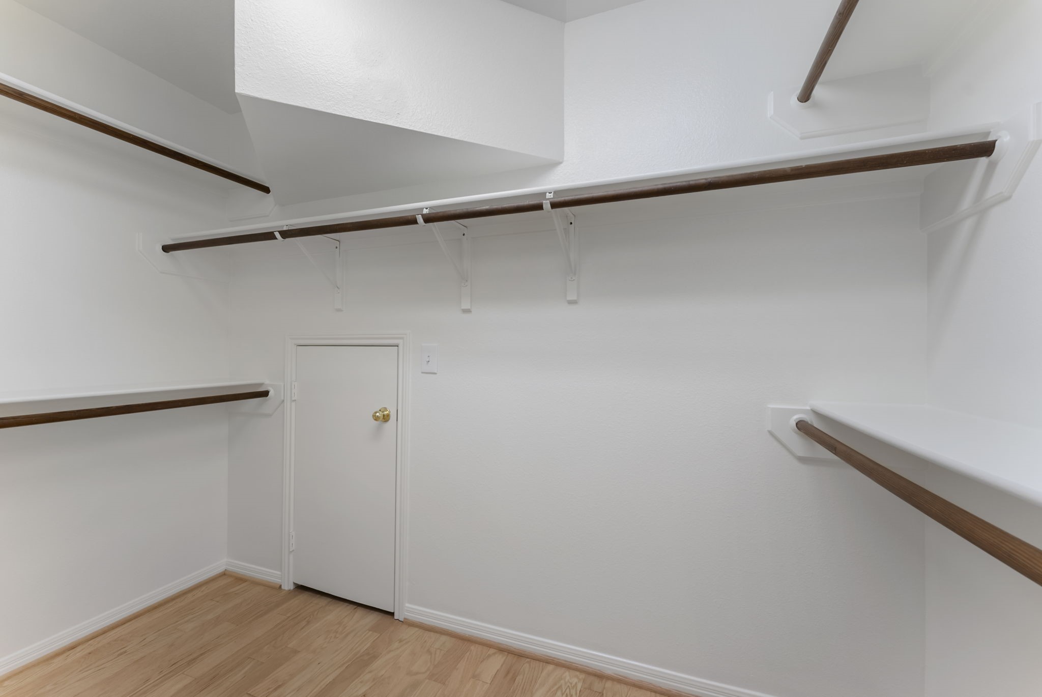 38 North Dragonwood Place Spring, TX 77381 - Photo 20 of 50 Walk-in closet in the primary bedroom.