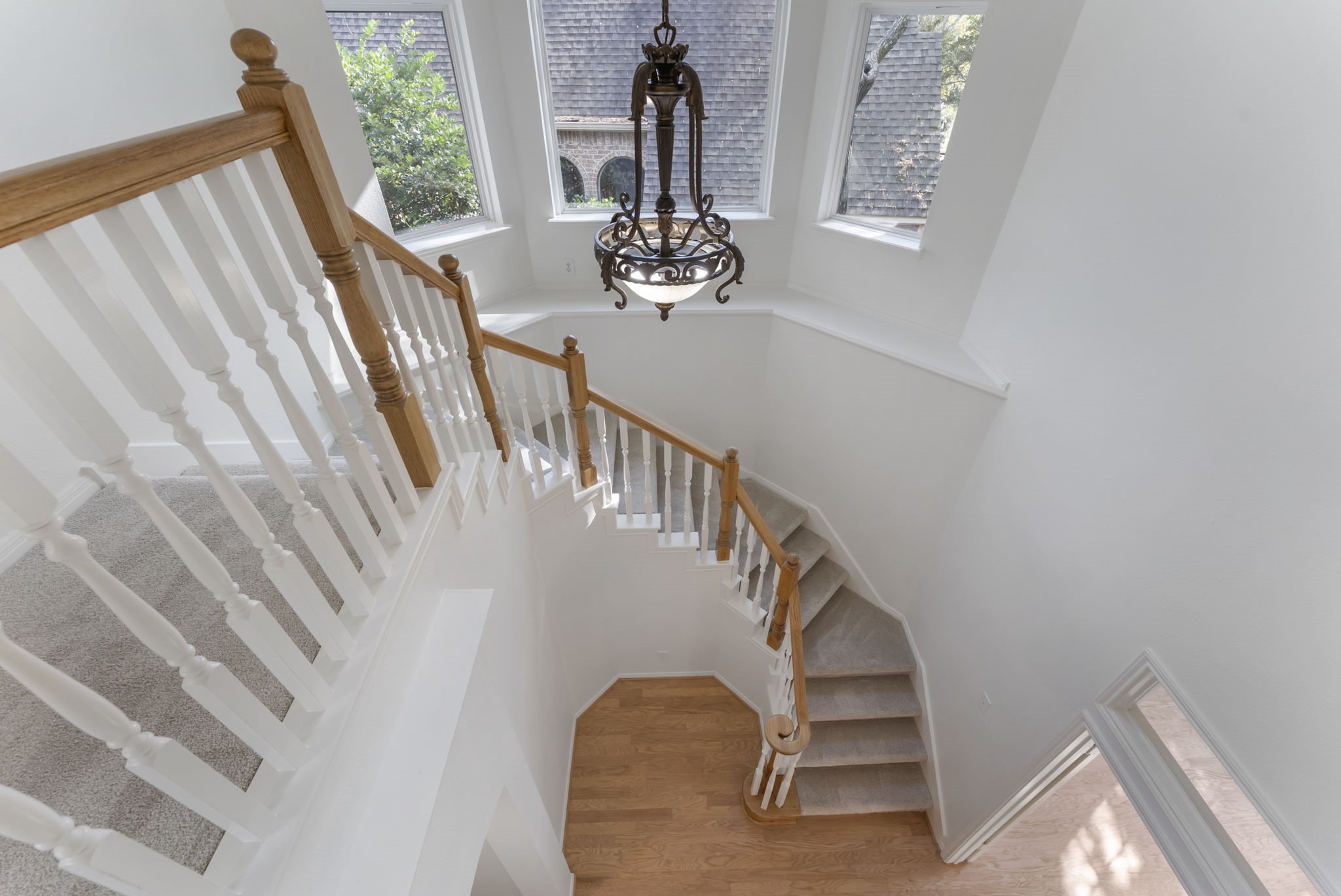 38 North Dragonwood Place Spring, TX 77381 - Photo 22 of 50 The stair case has also been re-finished and repainted.