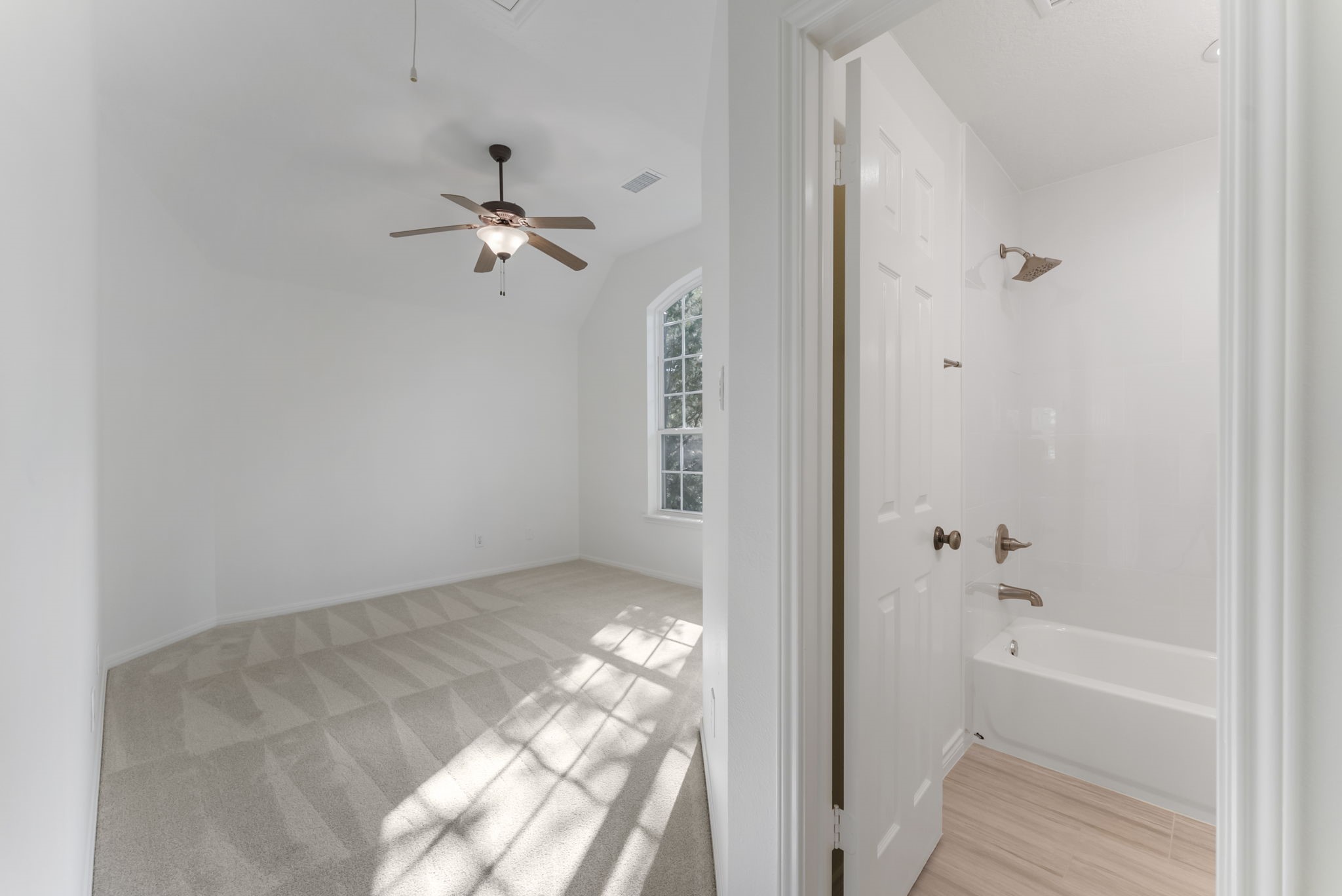 38 North Dragonwood Place Spring, TX 77381 - Photo 27 of 50 This secondary bedroom has an en-suite bathroom.