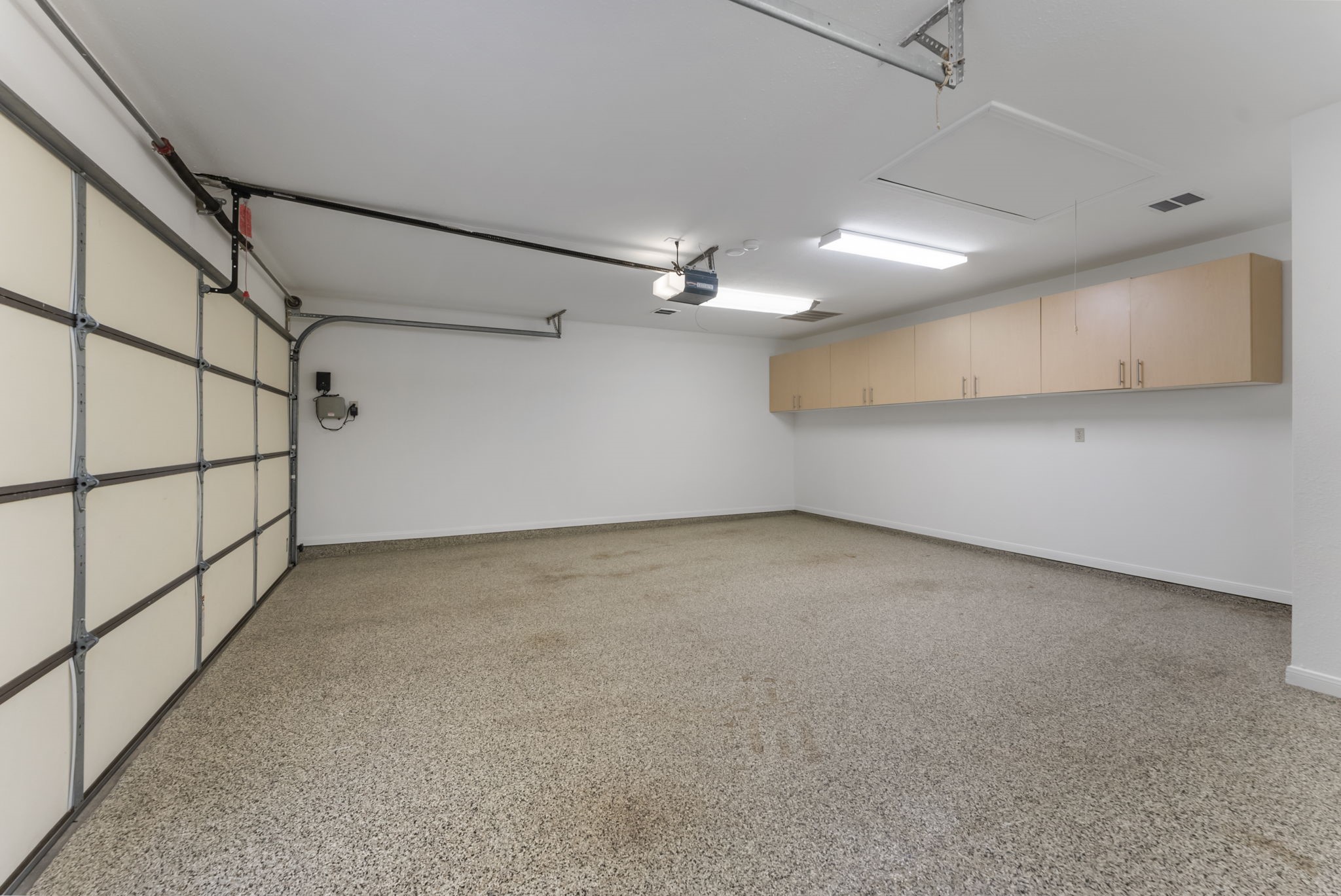 38 North Dragonwood Place Spring, TX 77381 - Photo 42 of 50 Oversized finished garage with generous built-in storage.