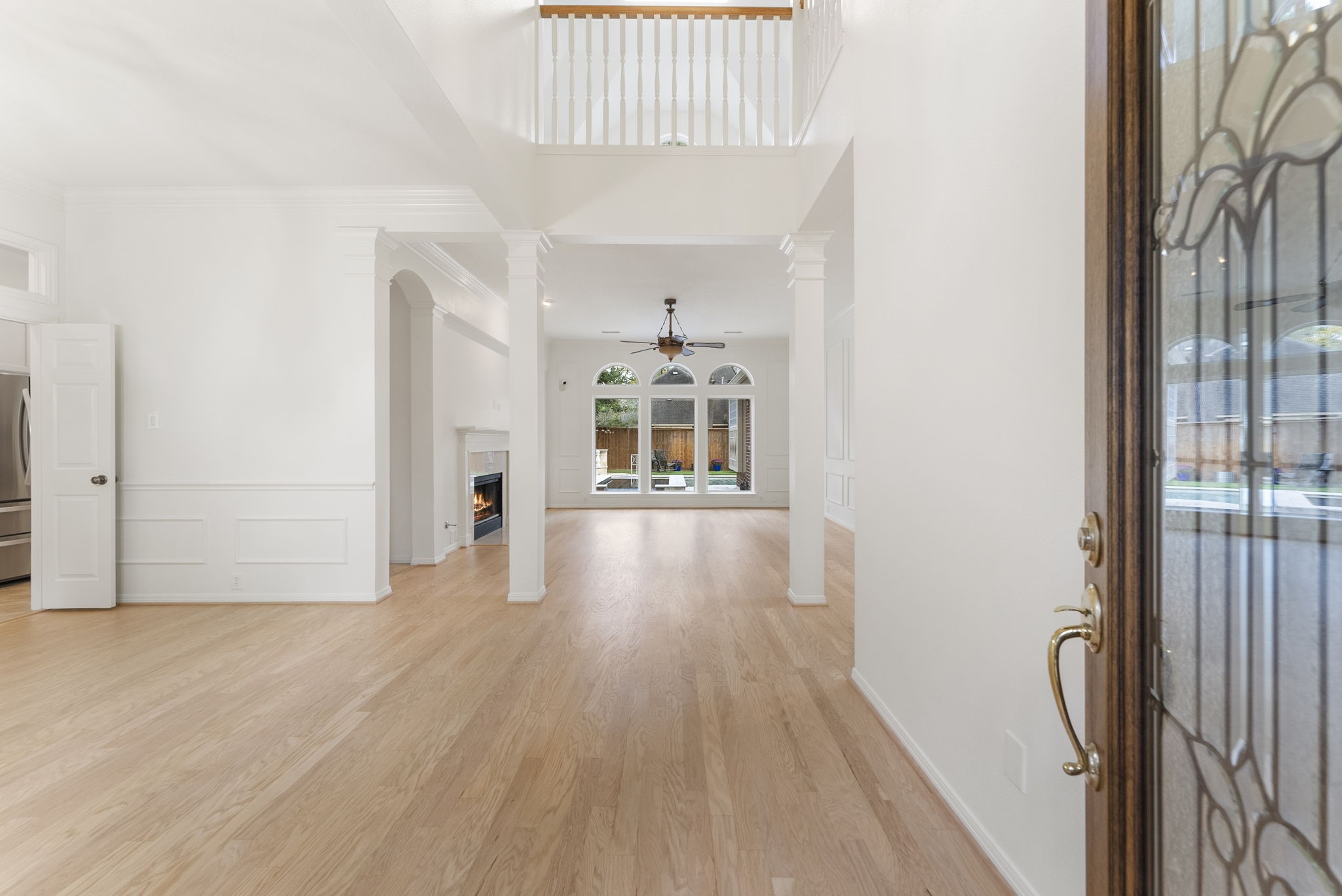 38 North Dragonwood Place Spring, TX 77381 - Photo 5 of 50 Inside, refinished wood flooring, high ceilings!