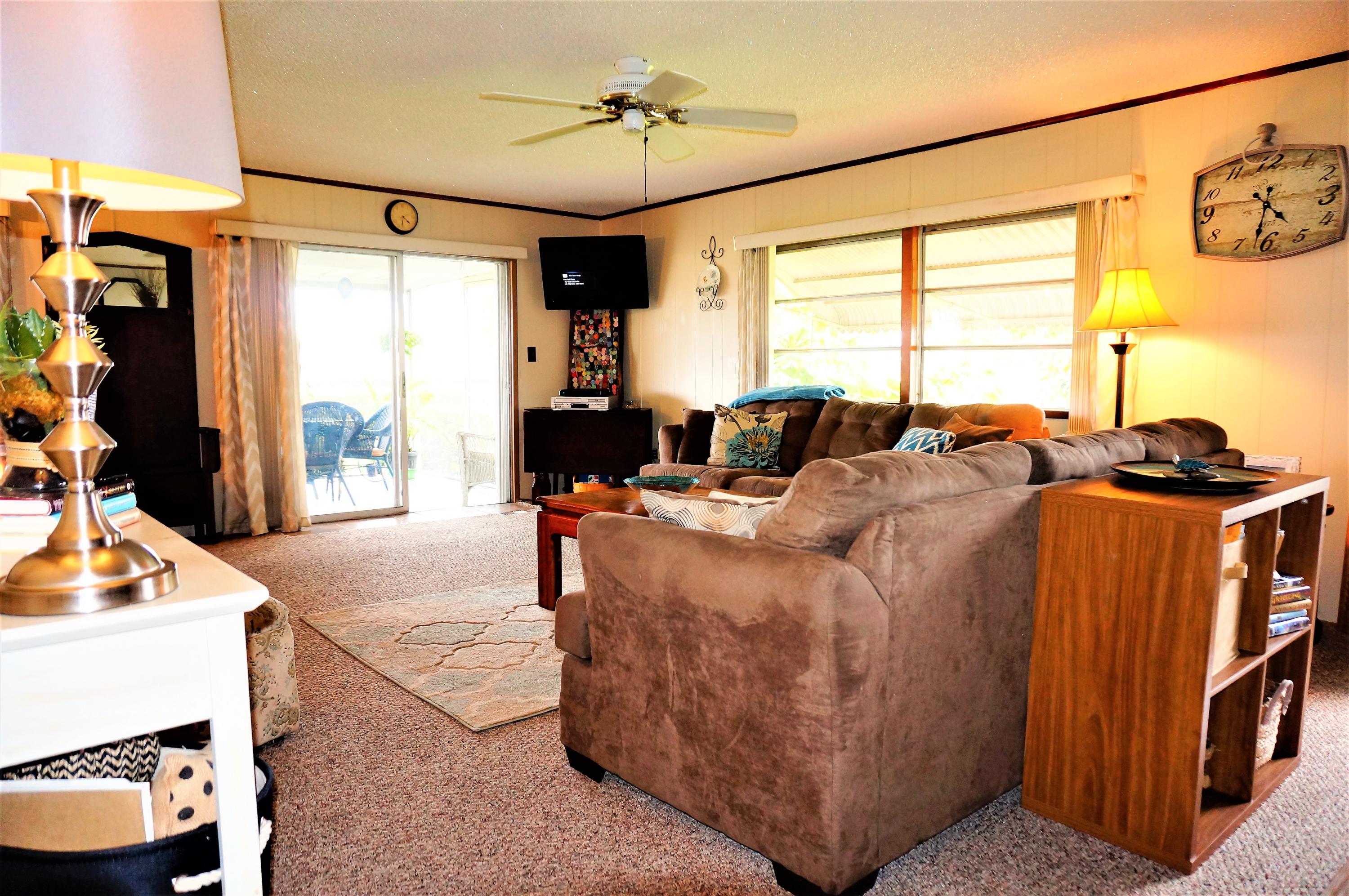 1560 Southwest 64th Way Boca Raton, FL 33428 - Photo 9 of 27 Living room to patio
