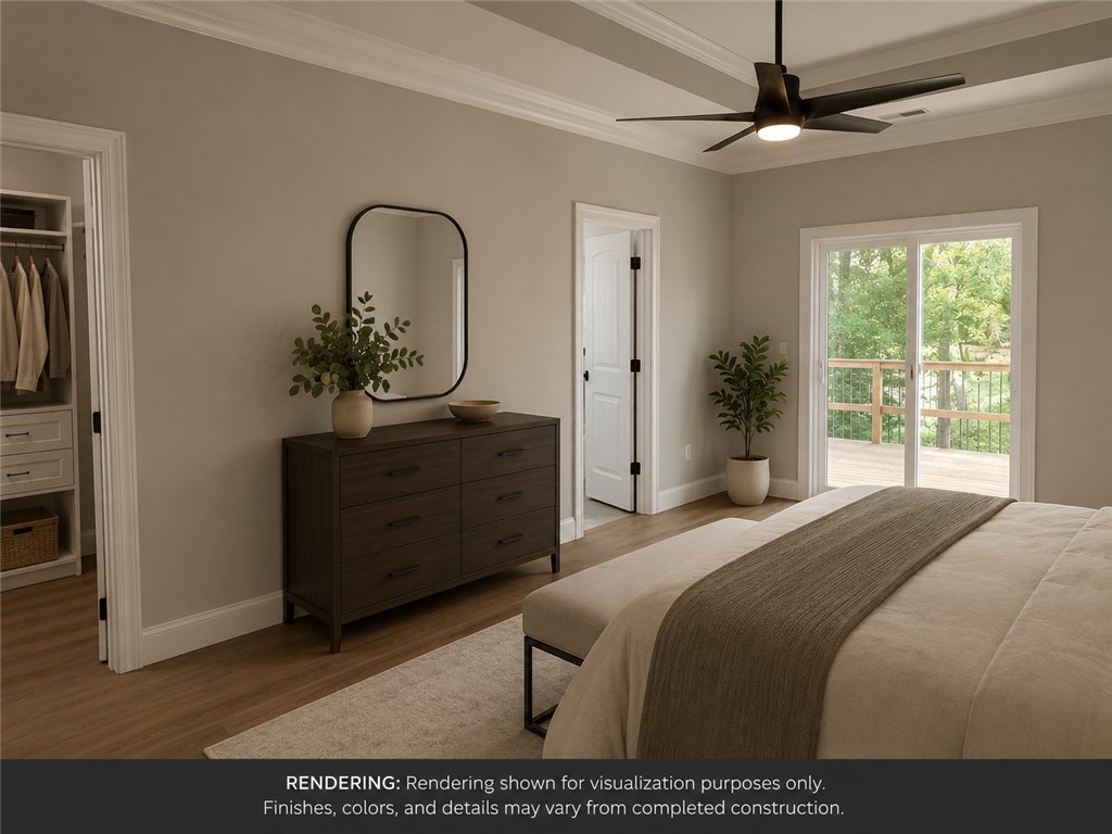 513 Quail Hollow Road Anderson, SC 29621 - Photo 4 of 39 This spacious bedroom offers direct access to an outdoor deck, perfect for relaxation.