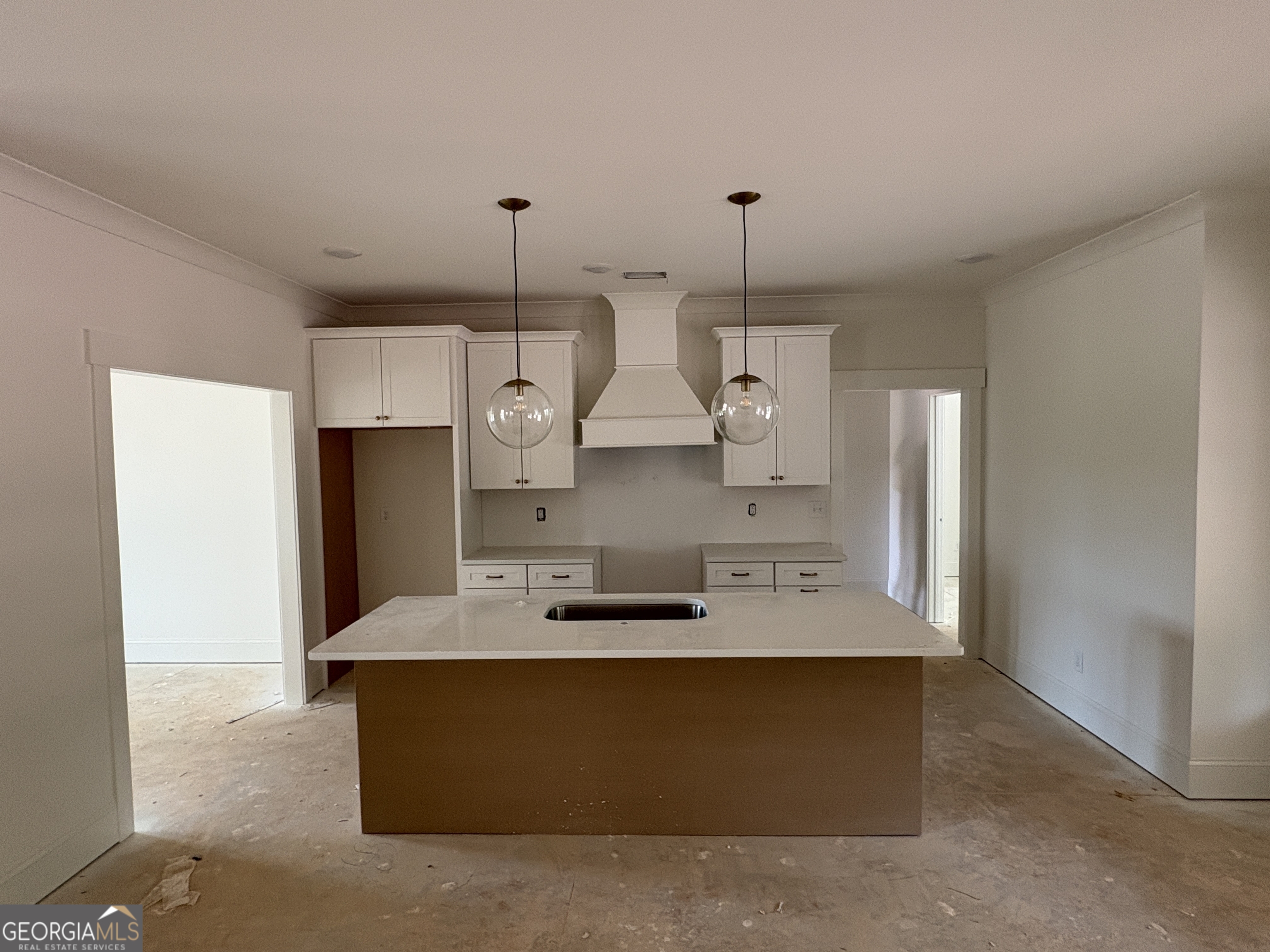 1867 Hoods Mill Road Jefferson, GA 30549 - Photo 2 of 2 a view of kitchen with granite countertop cabinets and refrigerator