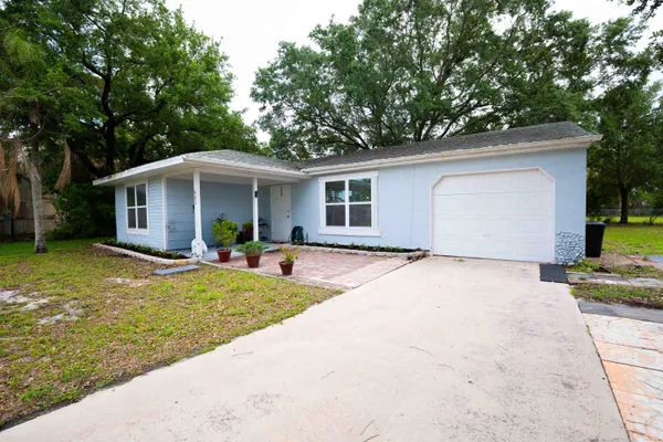 $299,000 | 402 Southwest Ruffner Court, Port St. Lucie, FL 34953