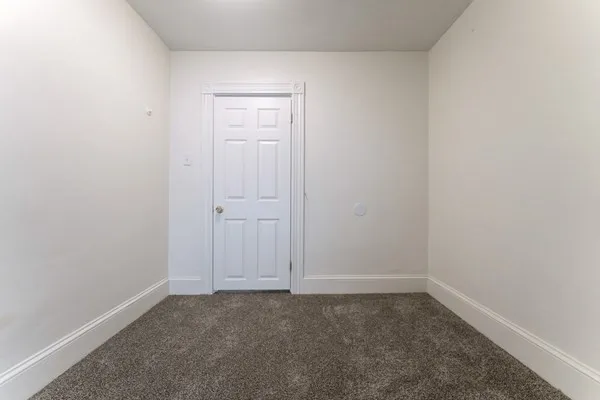 a bathroom with a mirror a sink and a mirror