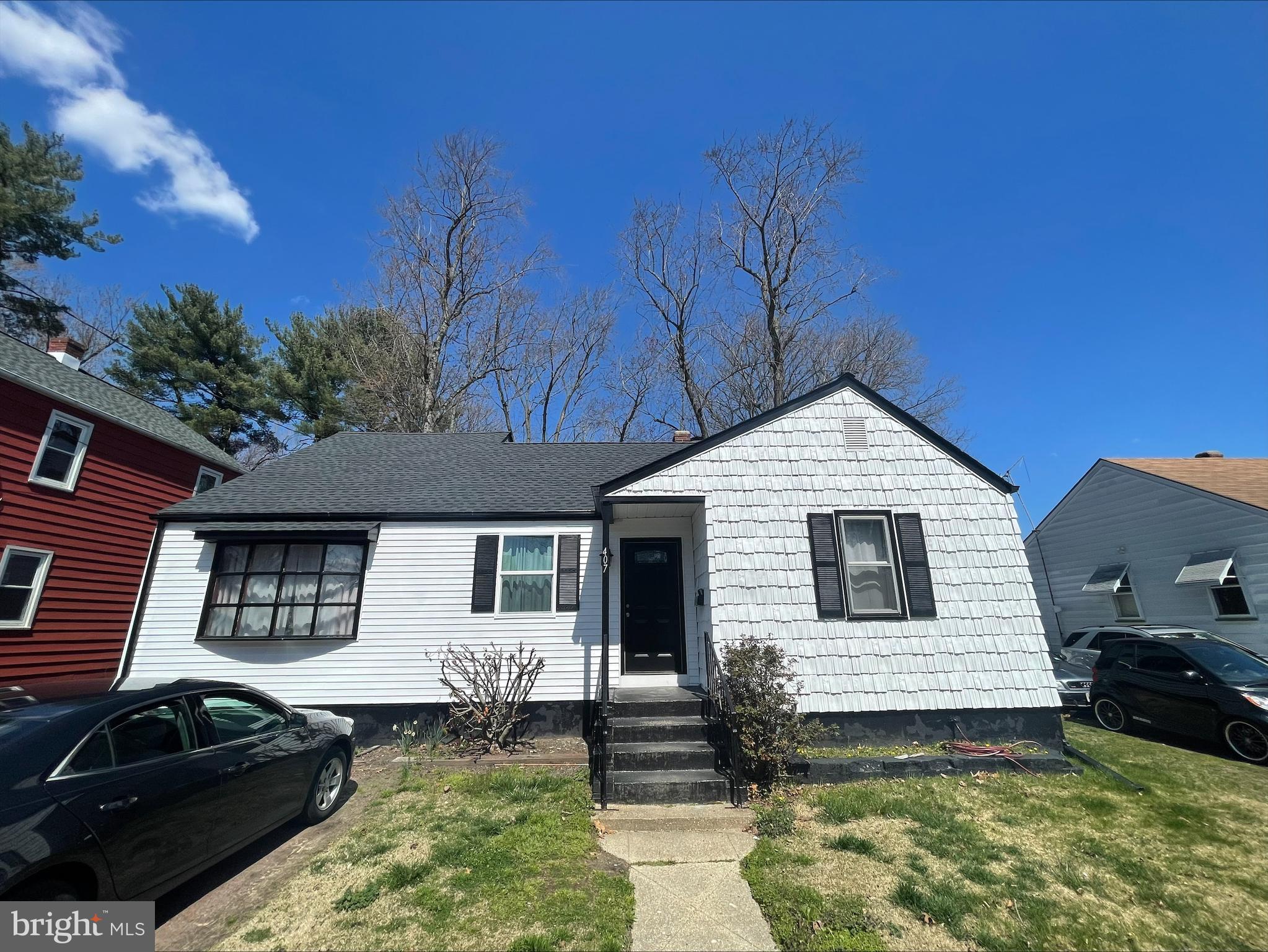 407 West High Street Glassboro, NJ 08028 - Photo 14 of 14 a view of a white house with a yard