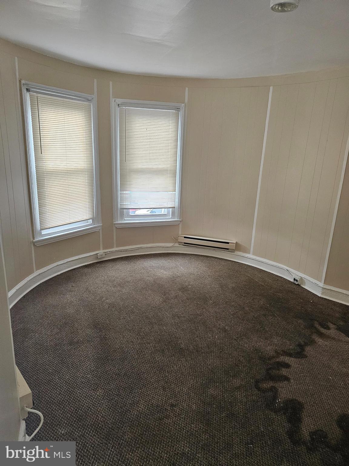 1322 Windrim Avenue Philadelphia, PA 19141 - Photo 7 of 14 an empty room with windows