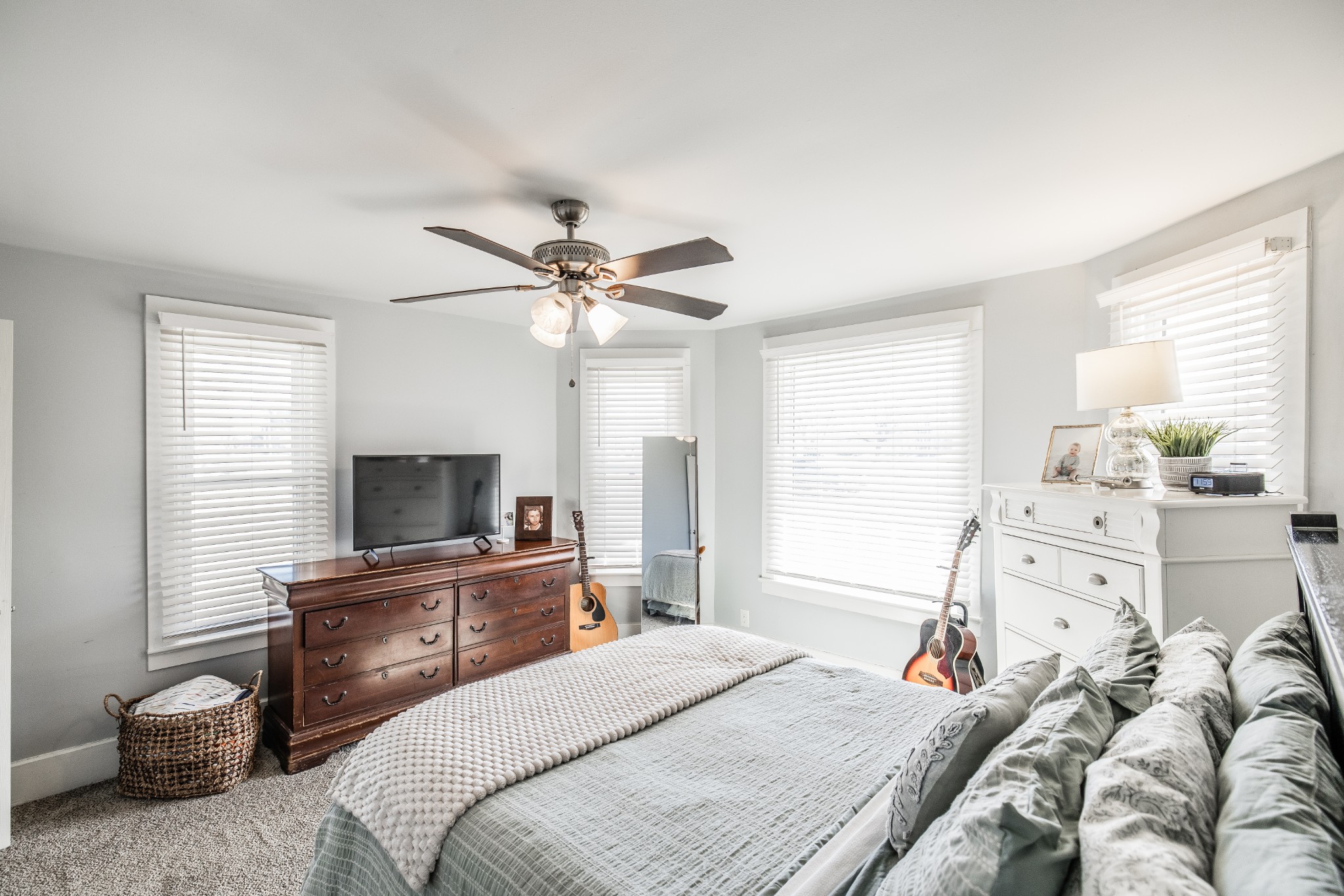 2999 Oak Grove Church Road Bethpage, TN 37022 - Photo 25 of 44 a bedroom with a bed and a flat screen tv