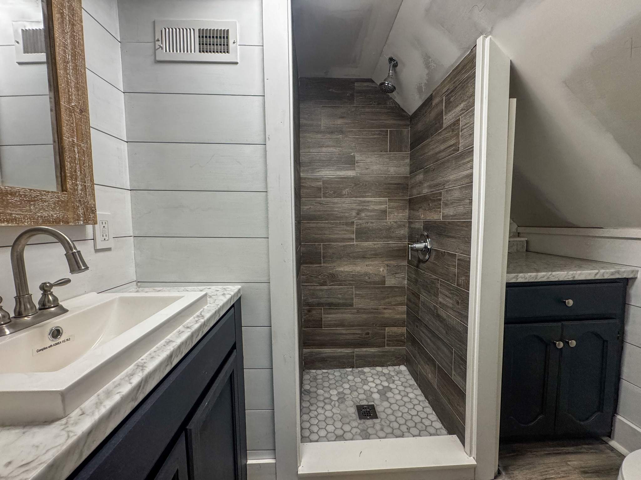 2999 Oak Grove Church Road Bethpage, TN 37022 - Photo 34 of 44 a bathroom with a sink a toilet and shower