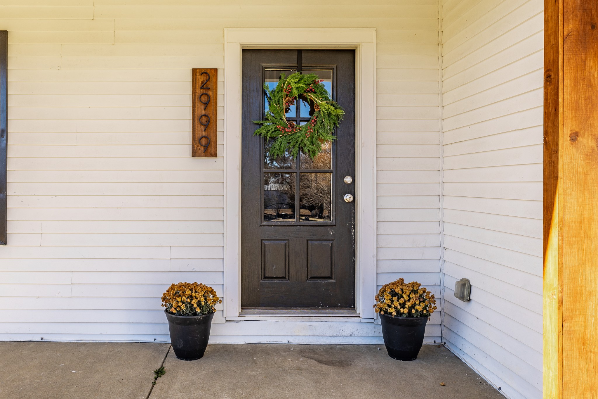 2999 Oak Grove Church Road Bethpage, TN 37022 - Photo 4 of 44 a front view of a house with outdoor seating