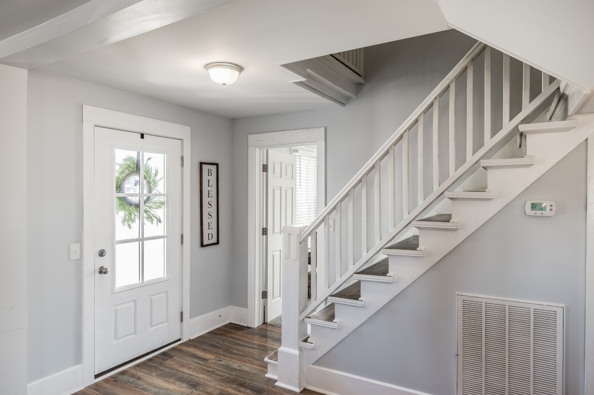 2999 Oak Grove Church Road Bethpage, TN 37022 - Photo 7 of 44 a view of entryway with wooden floor and stairs