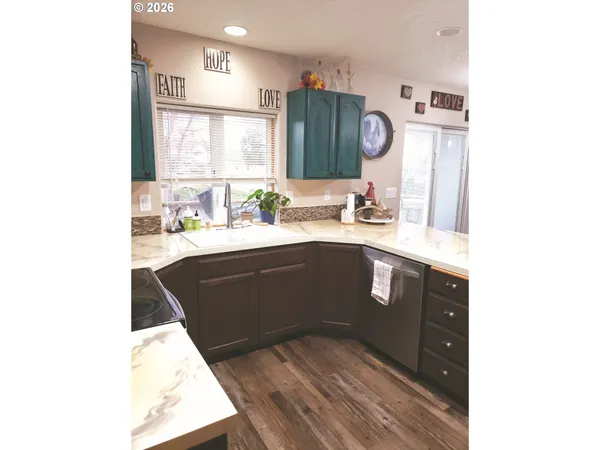 a bathroom with a sink vanity and mirror